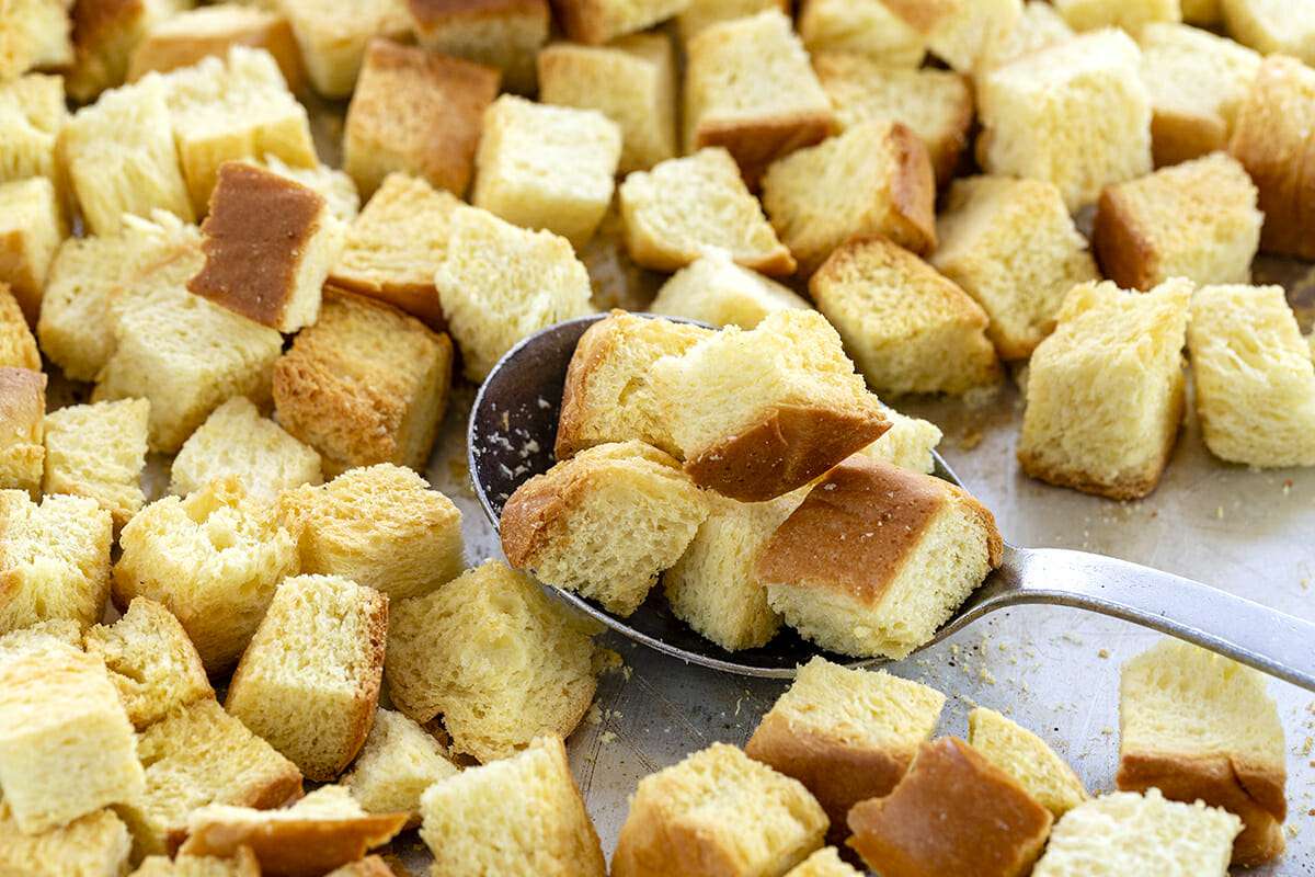 French Toast Casserole Overnight Recipe - toasted bread cubes on baking sheet