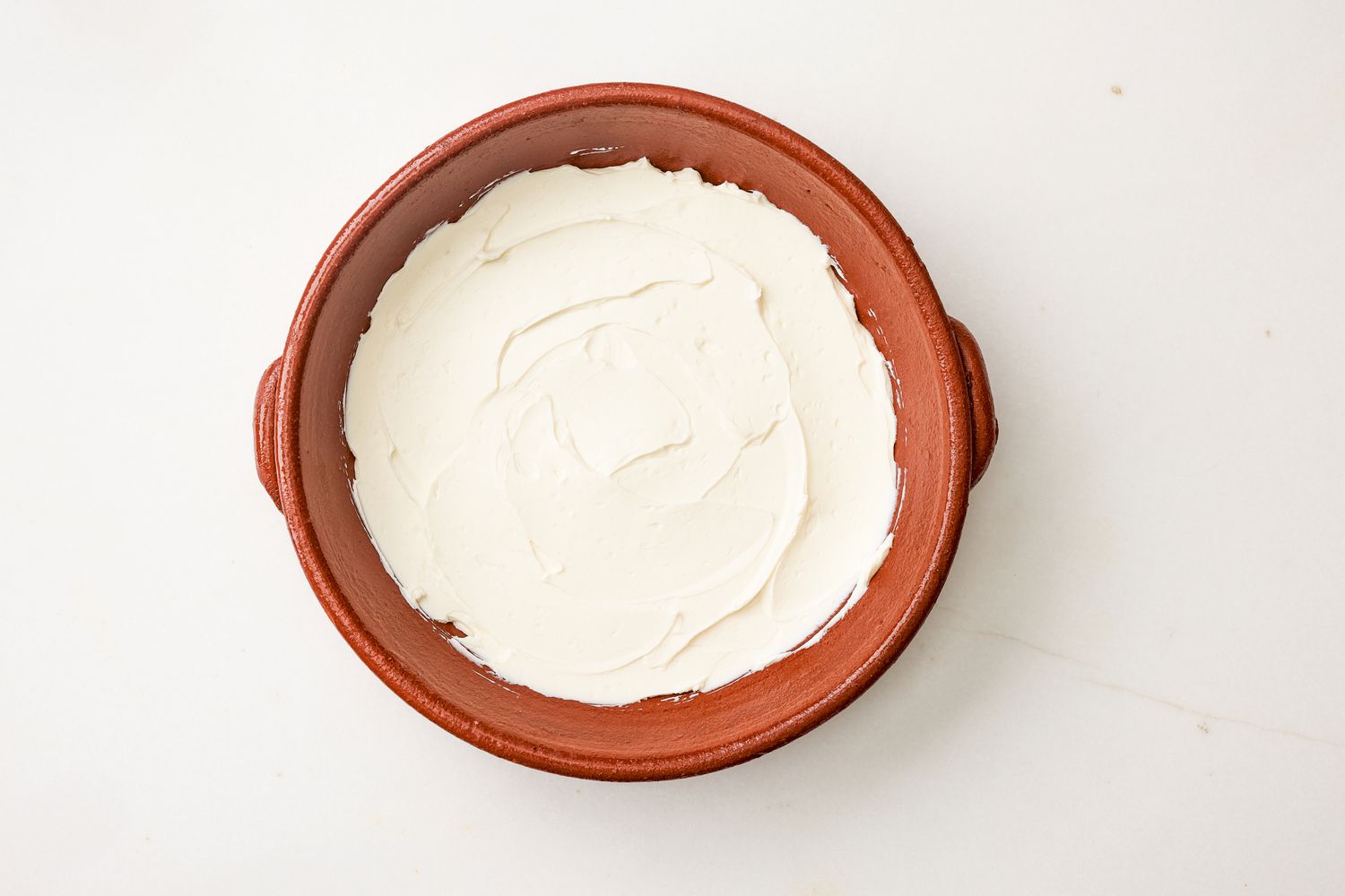 Layer of cream cheese layer for chili dip recipe