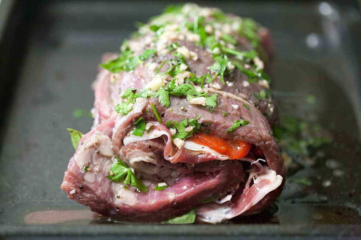 Stuffed flank steak on a sheet pan