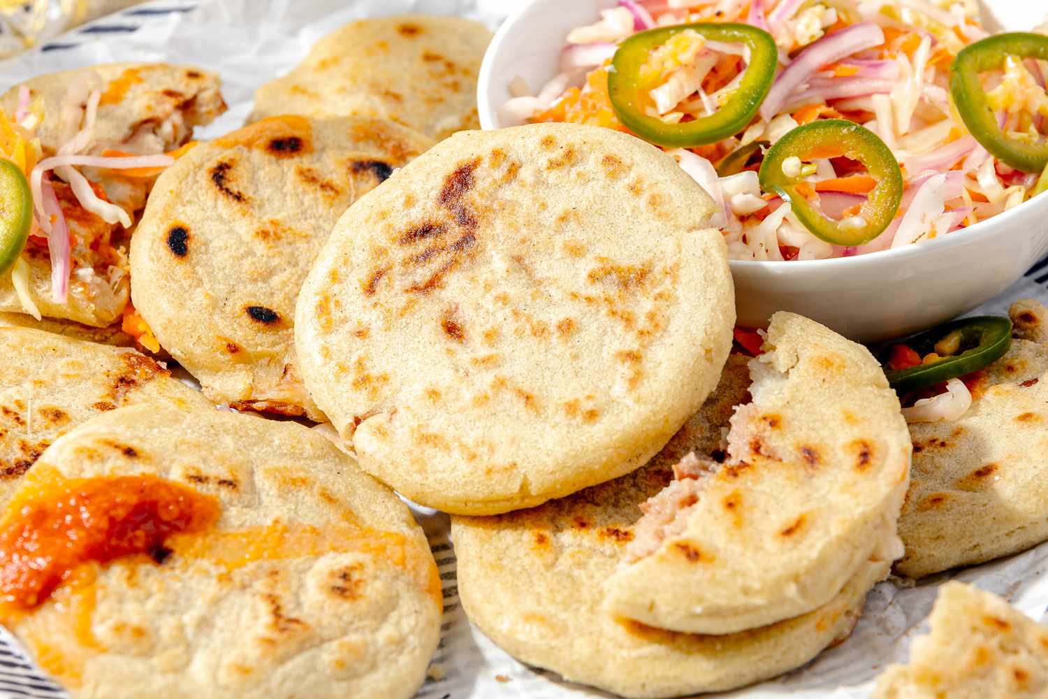 Plate of Pupusas with a Bowl of Curtido