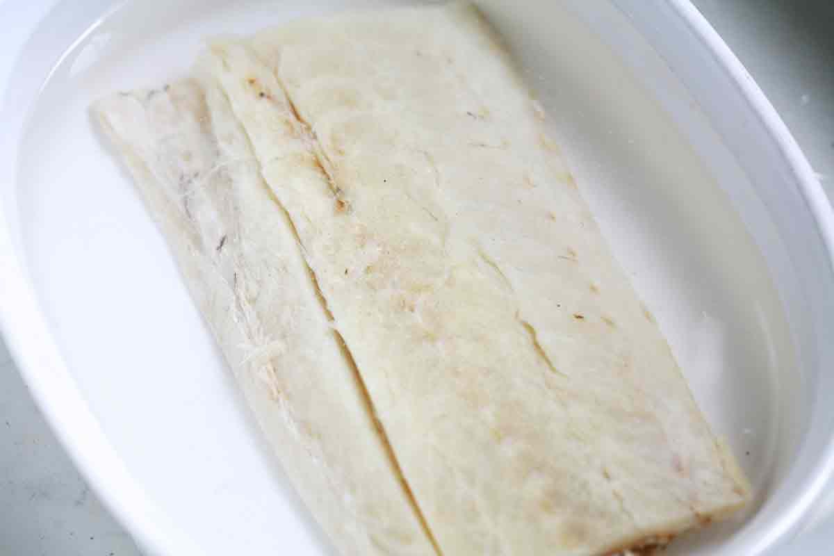 bacalao salt cod soaking in water