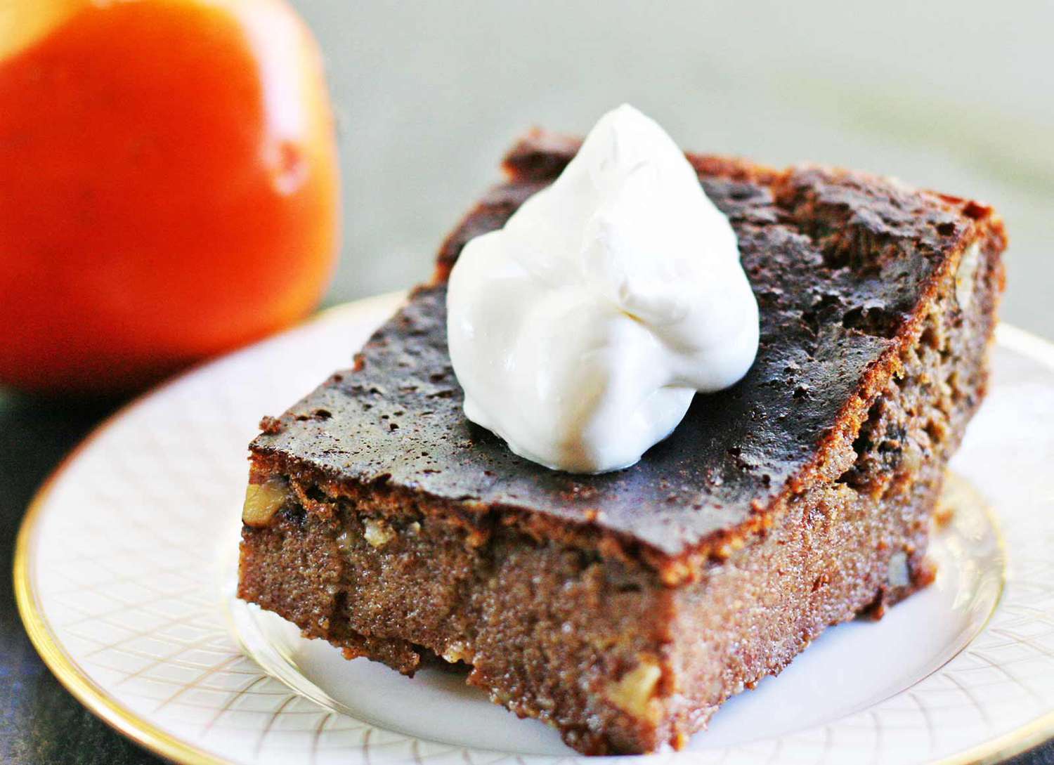 persimmon pudding cake with whipped cream