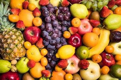 all kinds of different fruits in a cluster