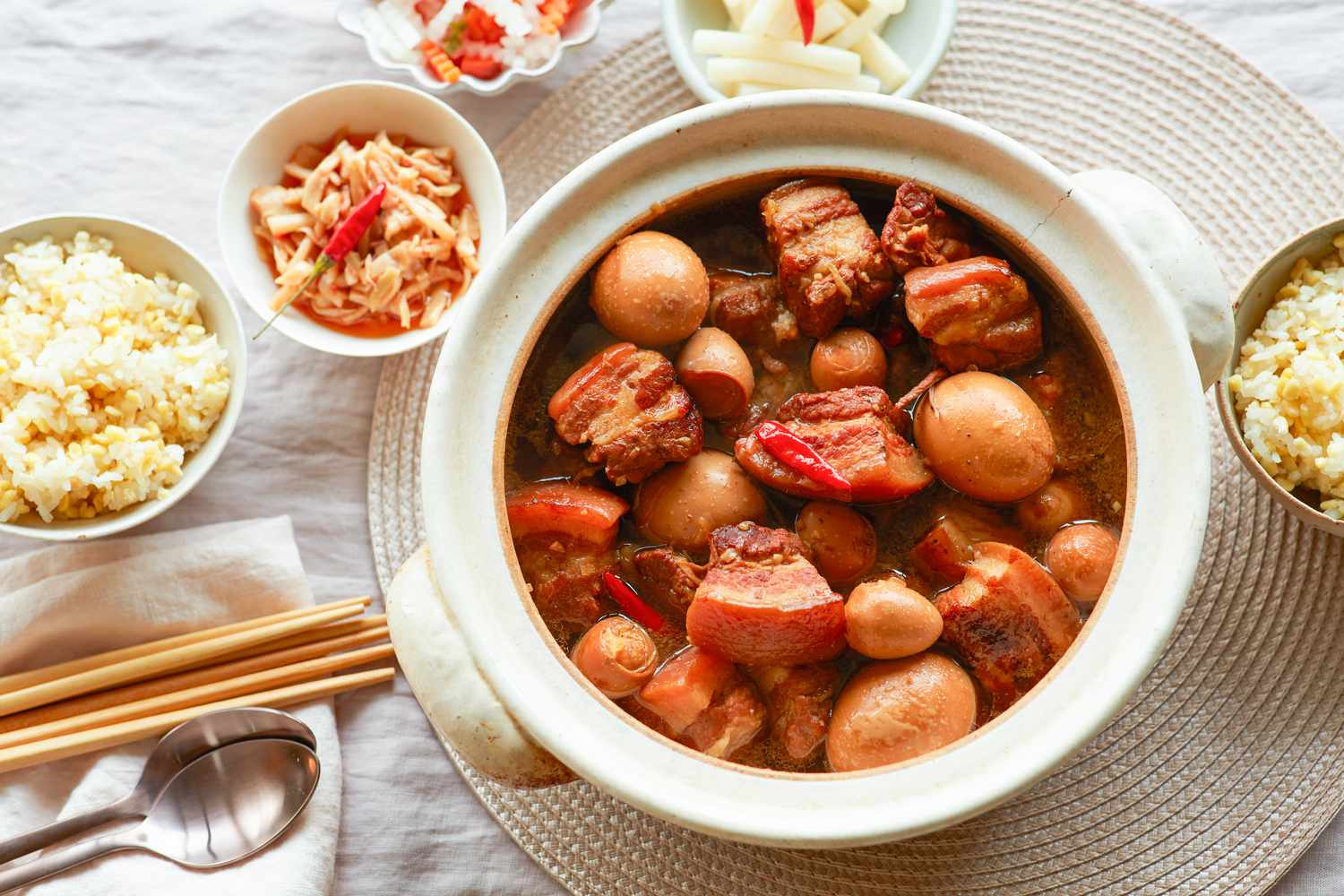 Overhead view of a pot of Sweet and savory braised pork belly.