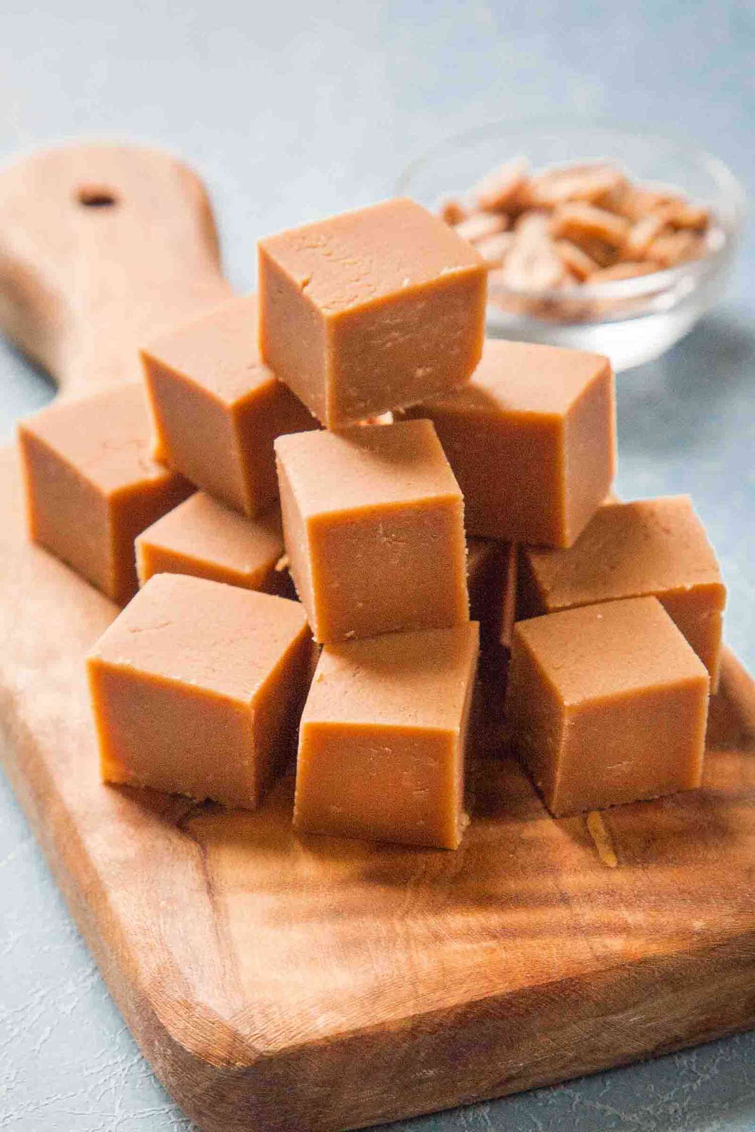 Easy Peanut Butter Fudge on a wooden serving platter