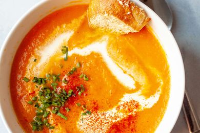 A bowl of carrot soup