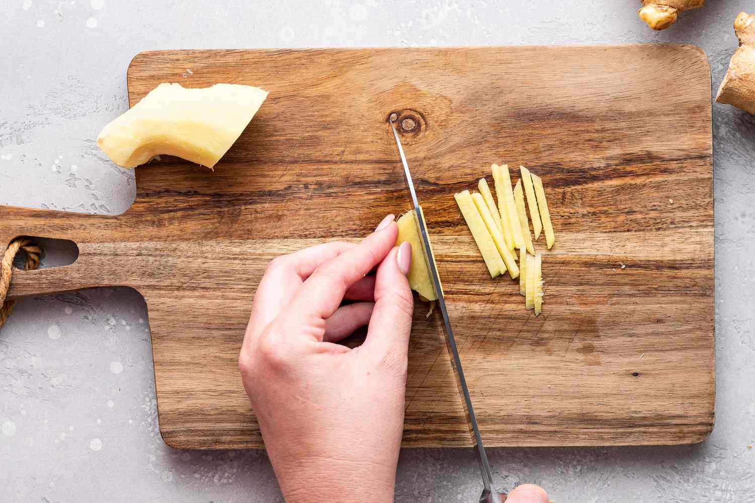Ginger Disks Stacked and Julienned into Matchsticks