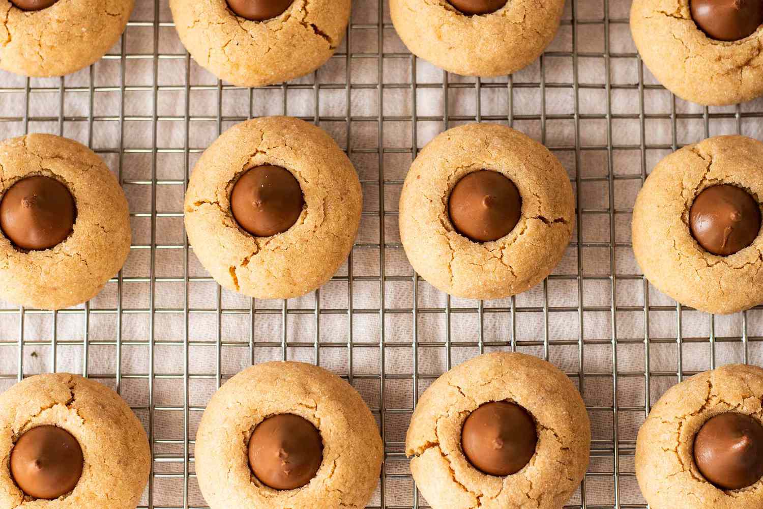 Overhead view of hershey kisses cookies on a cooling rack.