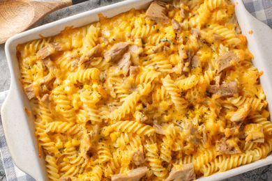 Overhead shot of a tuna noodle casserole in a white square baking dish